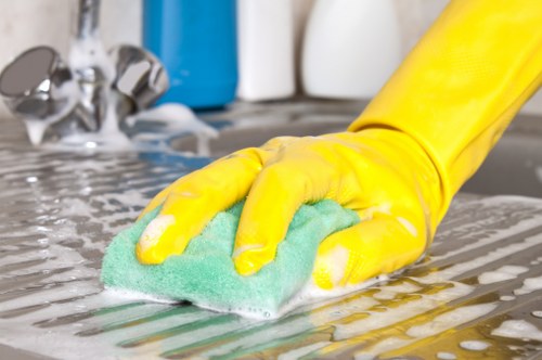 Deep carpet cleaning equipment removing dirt from a busy household carpet in Friern Barnet