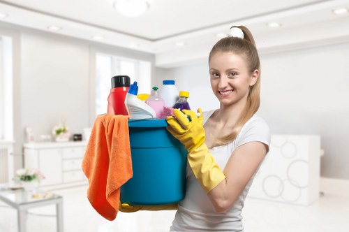 Cleaner reviewing service details before starting work